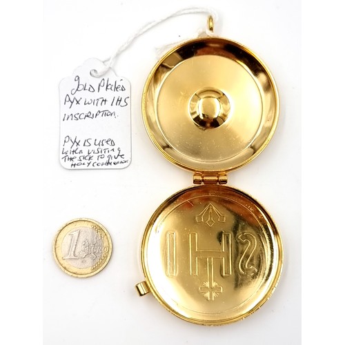 980 - A gold plated pyx communion set with I.H.S inscription.