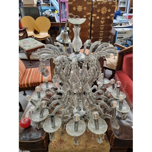 1011 - Star Lot : A huge striking 17 branch glass chandelier. A really impressive Chandleier with approx a ... 