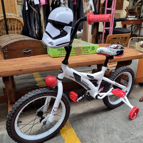 432 - An as new Star Wars ' Storm Trooper' theme chills bicycle. 16'' wheels complete with removeable stab... 