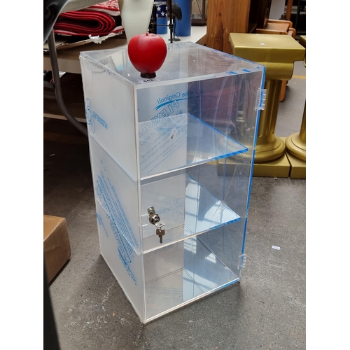 442 - A three tiered plexiglass display case ideal for commercial display and complete with original key. ... 