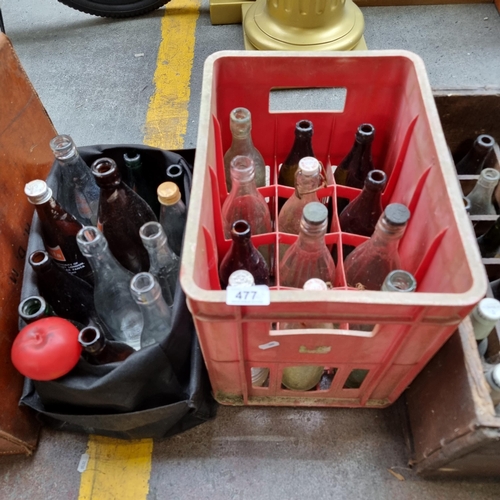 477 - A selection of vintage glass mineral bottles including examples by C&C and The Newry Mineral Water C... 