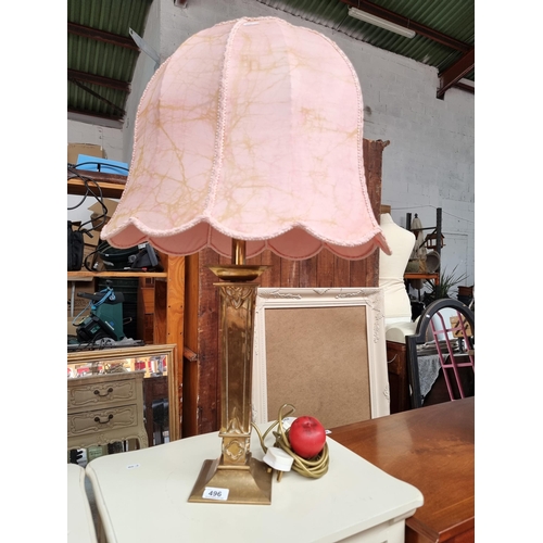 496 - Star Lot: A fabulous heavy brass art nouveau style table lamp with bell shaped shade in a pink marbl... 