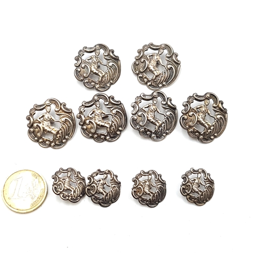 16 - A collection of Antique Sterling Silver Fortuna buttons consisting of six large and 4 smaller exampl... 