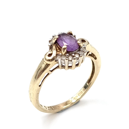 20 - Star Lot : A pretty amethyst and Diamond ring set in nine carat gold (375) with gemstone surround. R... 