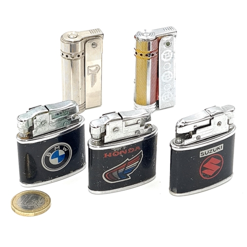 36 - A collection of three Trabi lighters marked Suzuki, Honda & BMW. Together with two further examples.