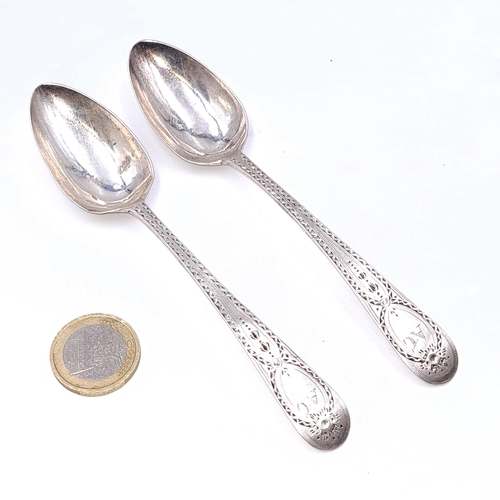 501 - Two sterling silver teaspoons hallmarked London - 1829. Set with attractive bright cut detailing. Le... 