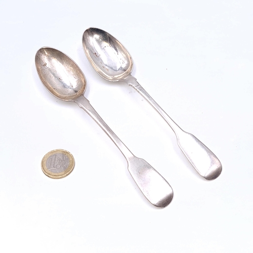 502 - Two Irish silver Victorian teaspoons. (Dated - 1857) Lengths - 15 cms. Total weight - 53.5 grams.