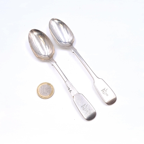 504 - Two Irish silver teaspoons dated 1818. Length - 15 cms. Weight - 54.84 grams.