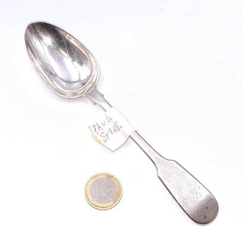 505 - A sterling silver dinner spoon hallmarked London - 1819. Length - 18 cms. Weight - 46.3 grams.