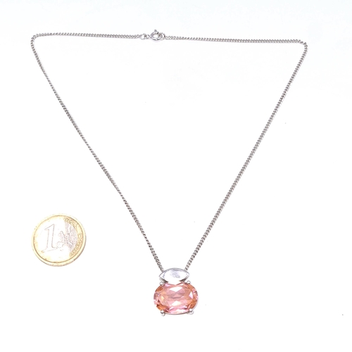 508 - An unusual sterling silver mounted Kunznite pendant with chain. Length - 40 cms. Weight - 14 grams.