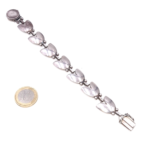 510 - Star Lot : A very interesting Georg Jensen tulip designed  Danish silver bracelet with 'Jensen' stam... 