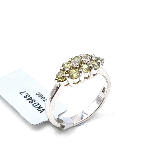 55 - A lovely peridot ring of 1.14 carats. Size: N - O. Comes with certificate of authenticity.  Set in S... 