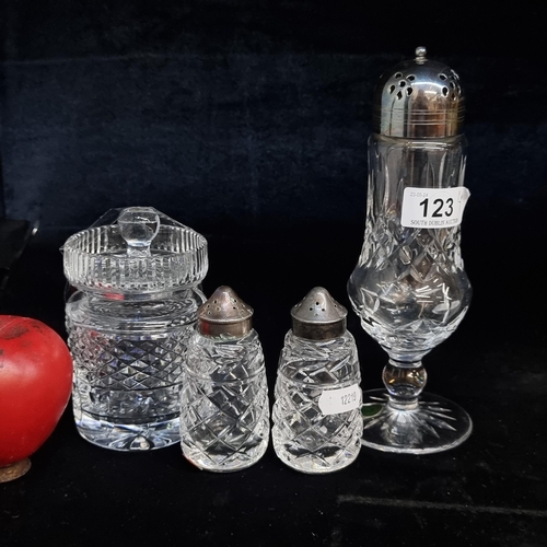 123 - A mixed lot of four Waterford Crystal items including a salt and pepper shaker, a sugar shaker and a... 