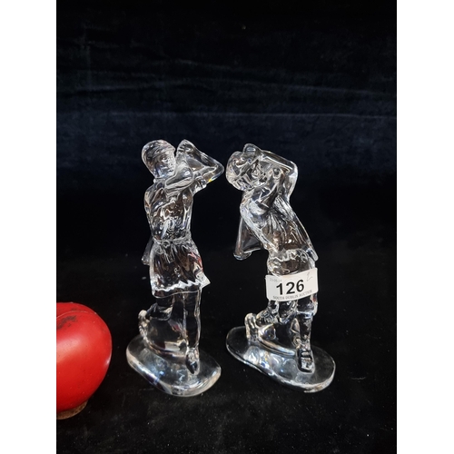 126 - Two Waterford Crystal figurines in the form of male and female golfers. Both in good condition with ... 