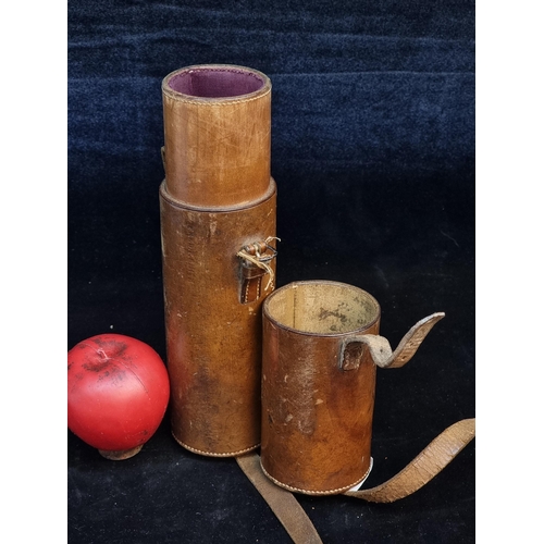 141 - An antique hunting saddle brown leather case for flasks. Embossed 'Fred. P. Smith'.