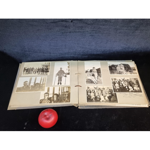 143 - Two fabulous early 20th century c. 1920s filled photo albums with brief inscriptions of names and pl... 