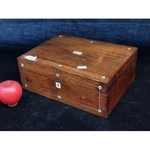 147 - A charming antique wooden jewellery box featuring inlay and Mother of Pearl marquetry to top and sil... 