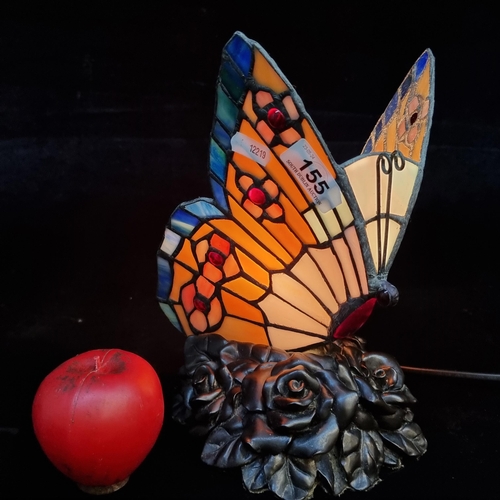 155 - A unique large Tiffany style table lamp in the form of a butterfly in very good condition. Seen smal... 