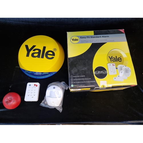 157 - A Yale easy fit standard house alarm. As new in box.