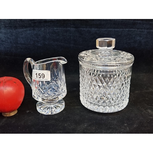 159 - Two lovely cut crystal items including a small Waterford Crystal pitcher along with a Cavan Crystal ... 