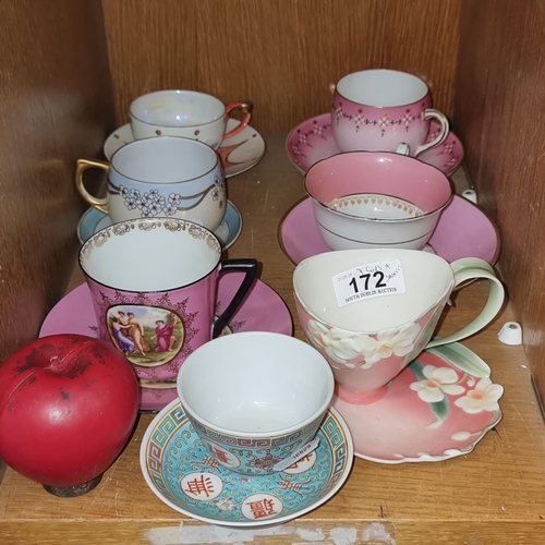 172 - A selection of seven cups and saucers including a nice oriental and china examples.