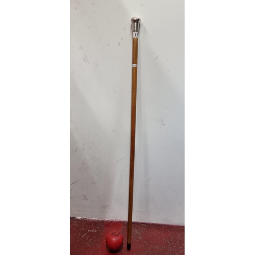 179 - A charming antique swagger stick / cane with an engraved silver top with indistinct London hallmarks... 