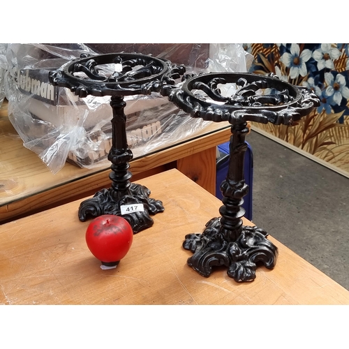 417 - A pair of heavy cast iron Victorian style trivet stands. Would also be great for plant pots etc.