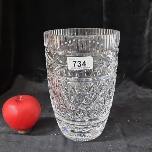 734 - A very large Waterford Crystal vase with intricate diamond cut design. in vgc.