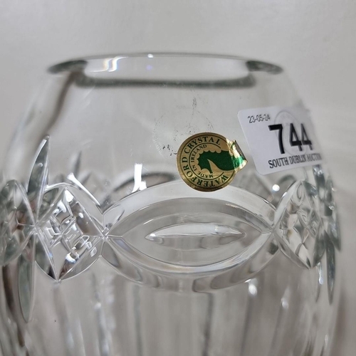 744 - A Waterford Crystal vase featuring intricate cut designs. Classic, elegant piece ideal for floral di... 