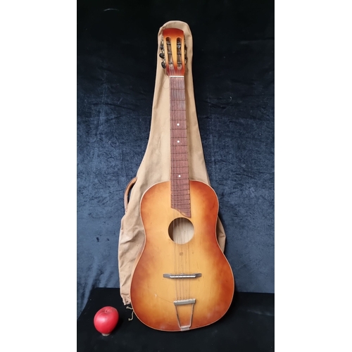 757 - Vintage Acoustic Guitar with a soft carrying case and classic slotted headstock. Features a warm nat... 