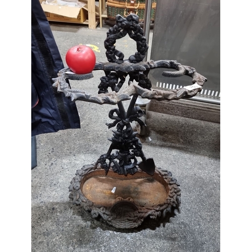 759 - Intricately designed Victorian  cast iron candle holder featuring a complex arrangement of leaf moti... 