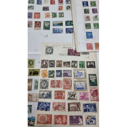 769 - Extensive collection of international and Australian stamps, featuring a variety of historical and c... 