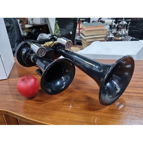 774 - Vintage dual trumpet air horn, sleek black finish, featuring 24V functionality, ideal for automotive... 