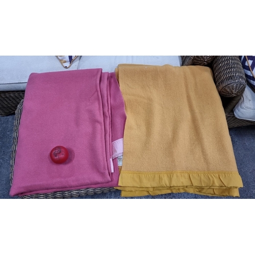 780 - Two vintage wool blankets: one pink 