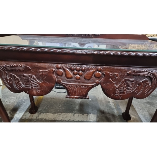 782 - Elegant antique console table featuring intricately carved fruit and foliate motifs with claw-foot l... 