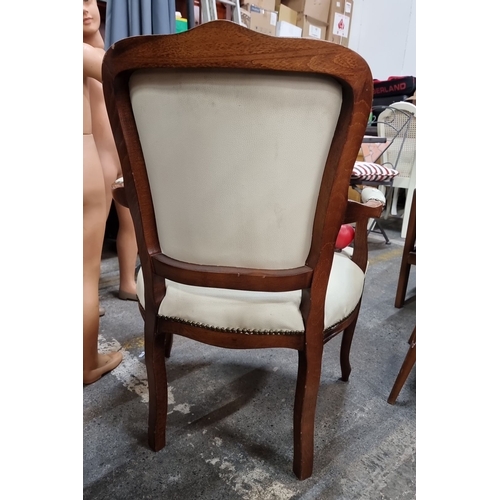 797 - Elegant late Victorian carved oak chair with cream upholstered seating and nailhead trim, in a grace... 