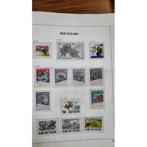 801 - Two albums of New Zealand commemorative stamps, richly detailed, ranging from Christmas themes to ro... 