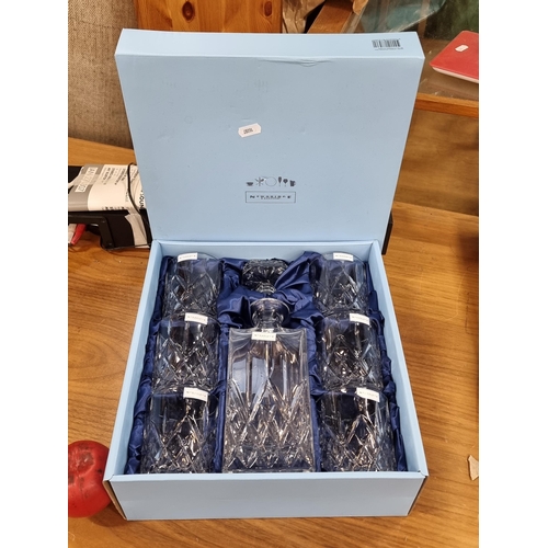 917 - A stunning Newbridge Home decanter set complete with six tumbler glasses and decanter bottle. With o... 