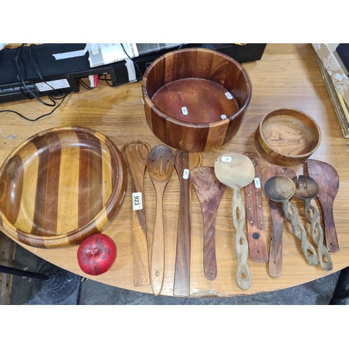 923 - A selection of highly useful wooden hand turned culinary items including salad serving utensils and ... 