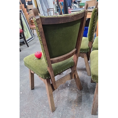 810 - Set of 4 vintage dining chairs with carved wooden frames and olive green velvet upholstery, adorned ... 