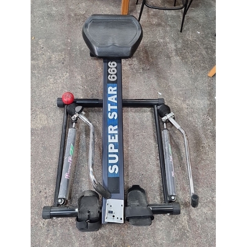 813 - Super Star 660 rowing machine featuring adjustable resistance settings and a comfortable, sliding se... 