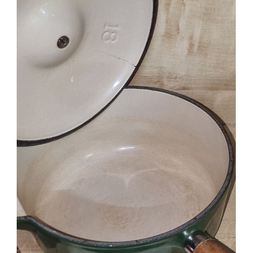 829 - Vintage Le cruset heavy green clean enamel saucepan with wooden handle and pour. A versatile and cha... 