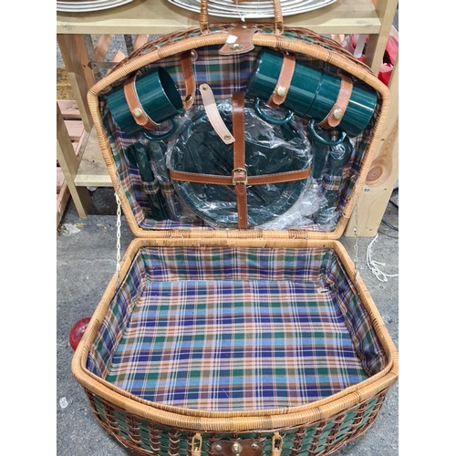 832 - Vintage-style picnic basket with wicker exterior and green fabric detailing, complete with a deluxe ... 