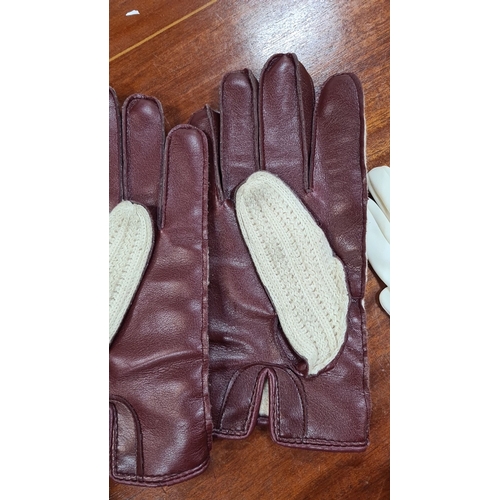 834 - Assorted collection of vintage gloves featuring various materials including leather, suede, and knit... 