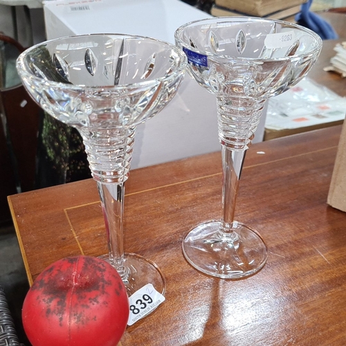 839 - Pair of Waterford crystal martini glasses, featuring intricate cut designs and elegant stems, marked... 