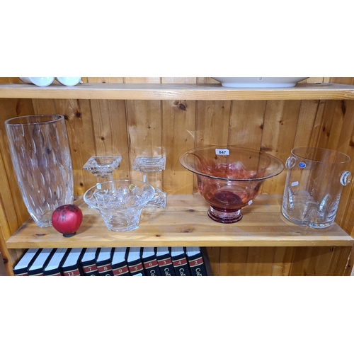 847 - Elegant assortment of crystal glassware including cut lead crystal bowls and decorative vases, with ... 