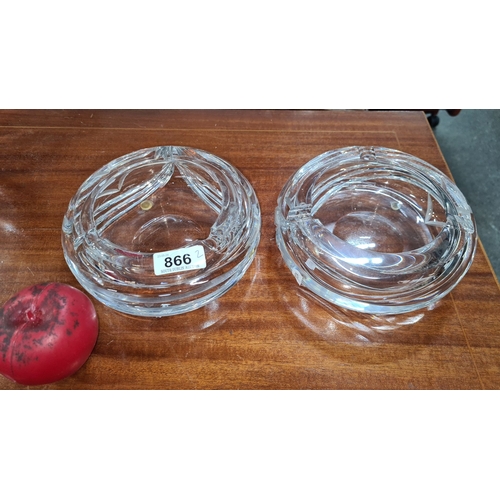 866 - Pair of very heavy crystal ashtrays featuring elegant spiral designs.