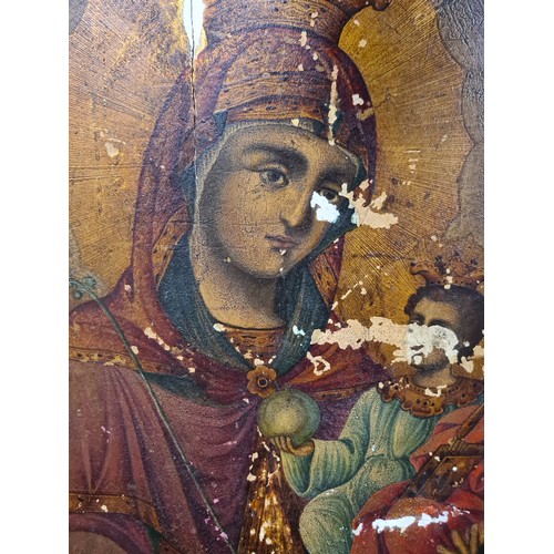 95 - Star Lot: An amazing 17th century Russian tempera on oak panel painting. Titled 'The Mother of God' ... 