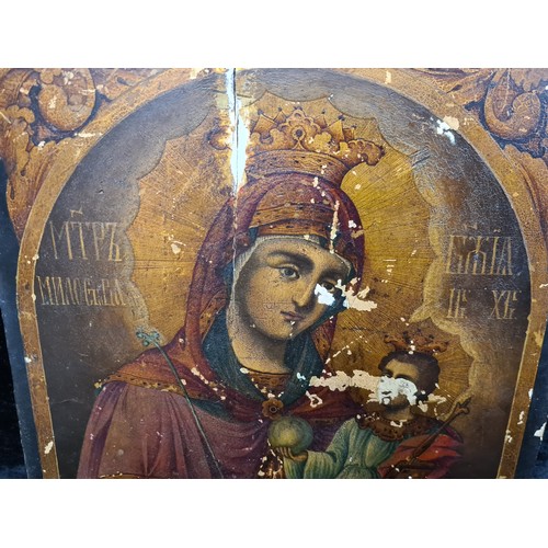 95 - Star Lot: An amazing 17th century Russian tempera on oak panel painting. Titled 'The Mother of God' ... 