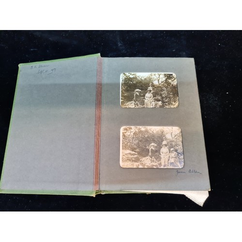 136 - A fabulous antique early 20th century photo album of photographs of families, friends and scenes of ... 